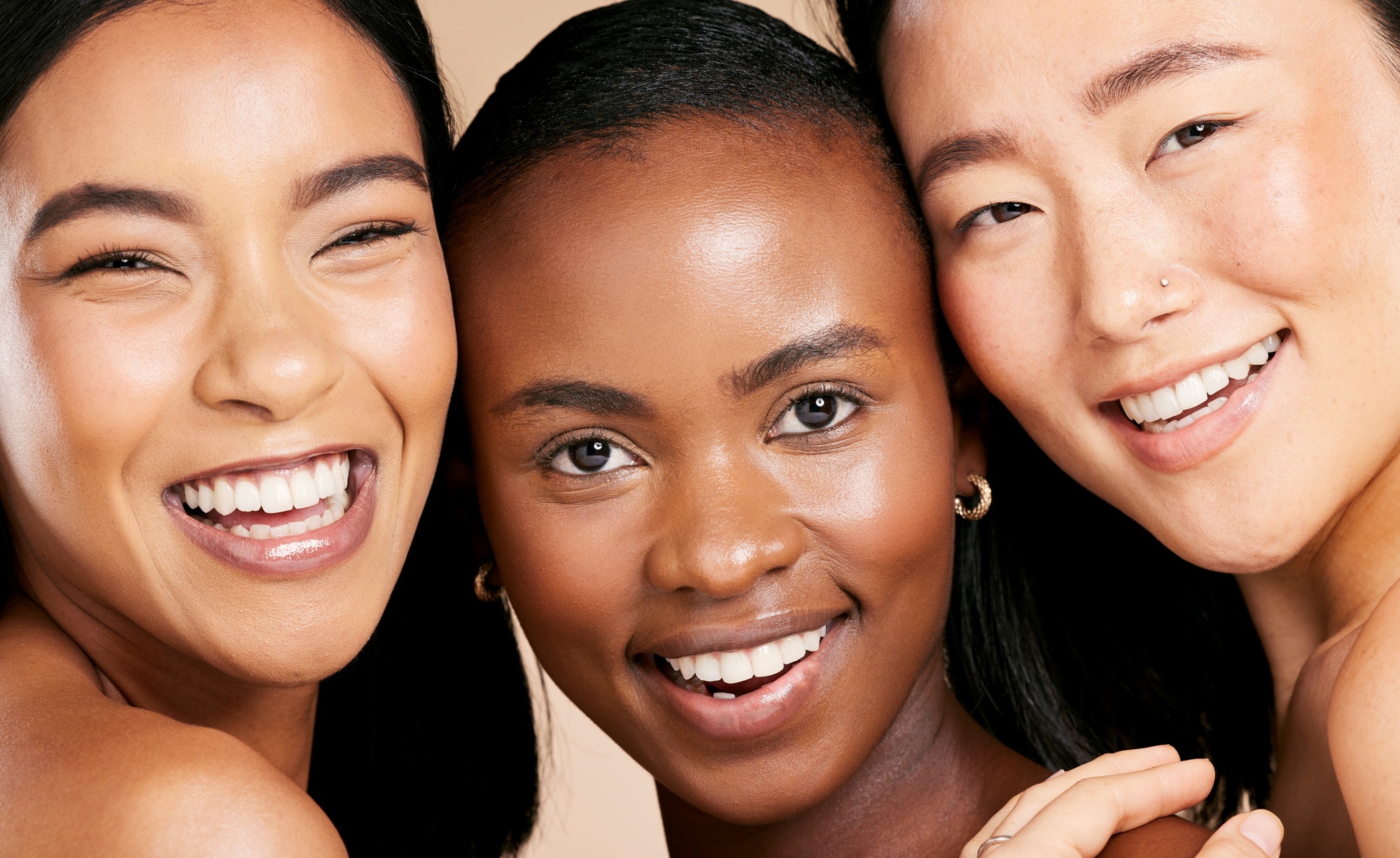 Portrait of happy women with beauty, diversity and smile for skincare cropped on studio background.