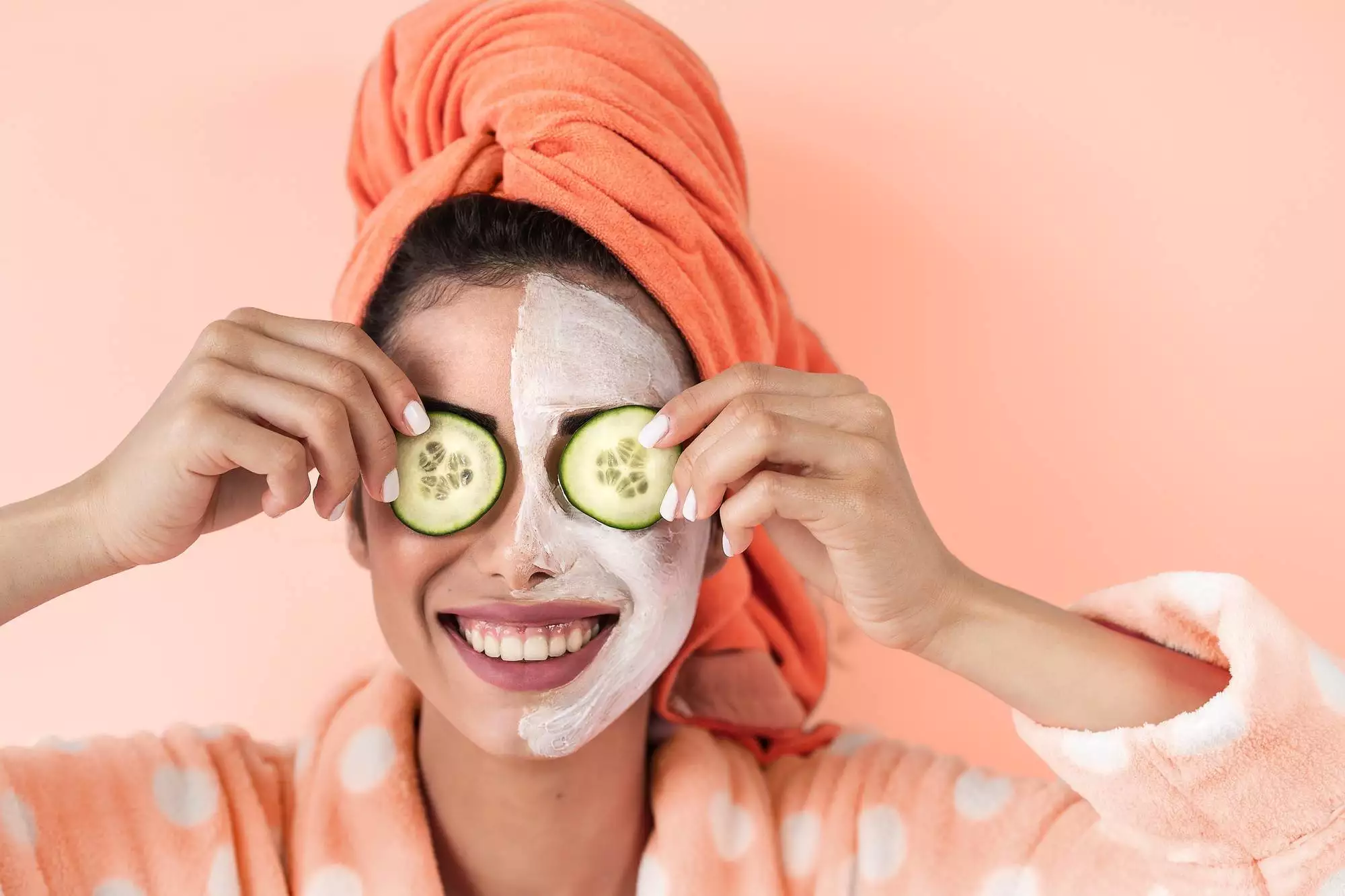 Young woman having skin care spa day at home